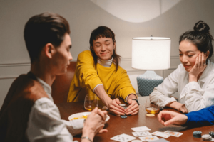4 Persons Playing blackjack at home